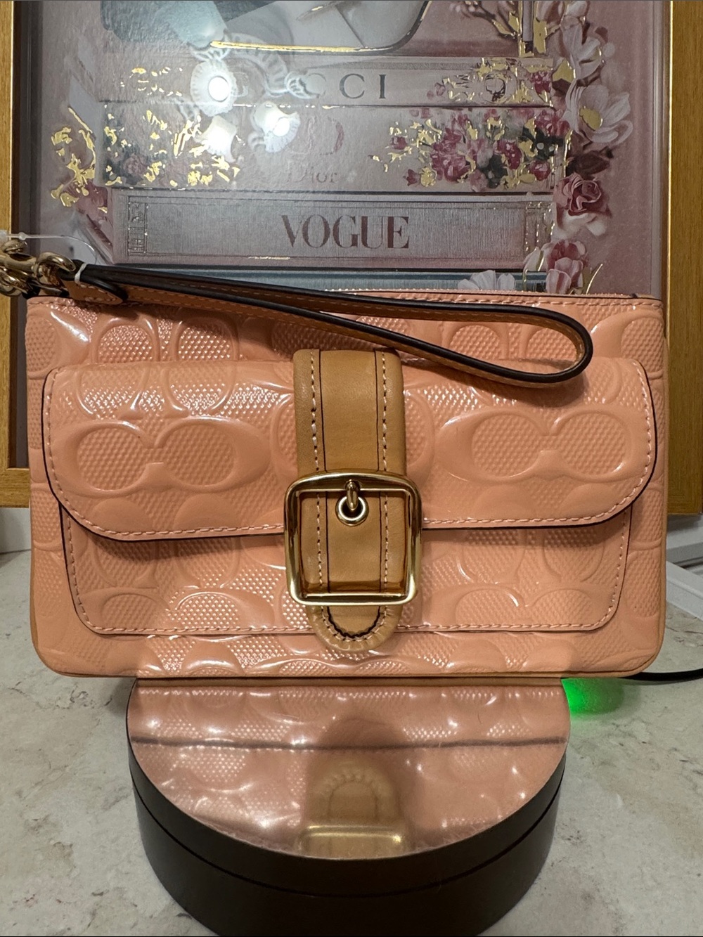 Coach Ashton’s peach patent embossed wallet wristlet New